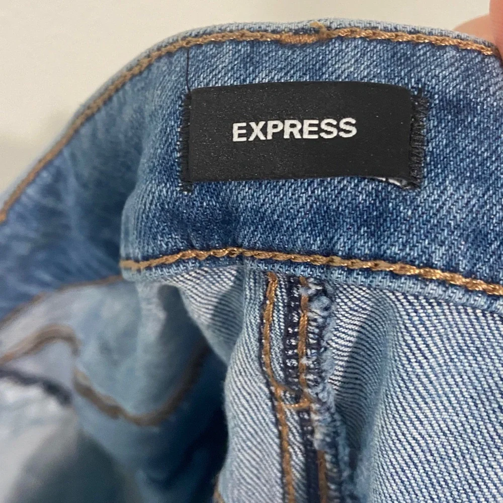 Express Distressed Blue Skinny Jeans. Size 38x 32